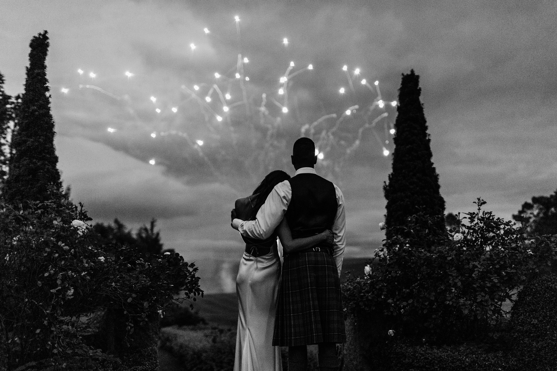 raw files explained toronto wedding photographer photo of bride groom watching fireworks moody