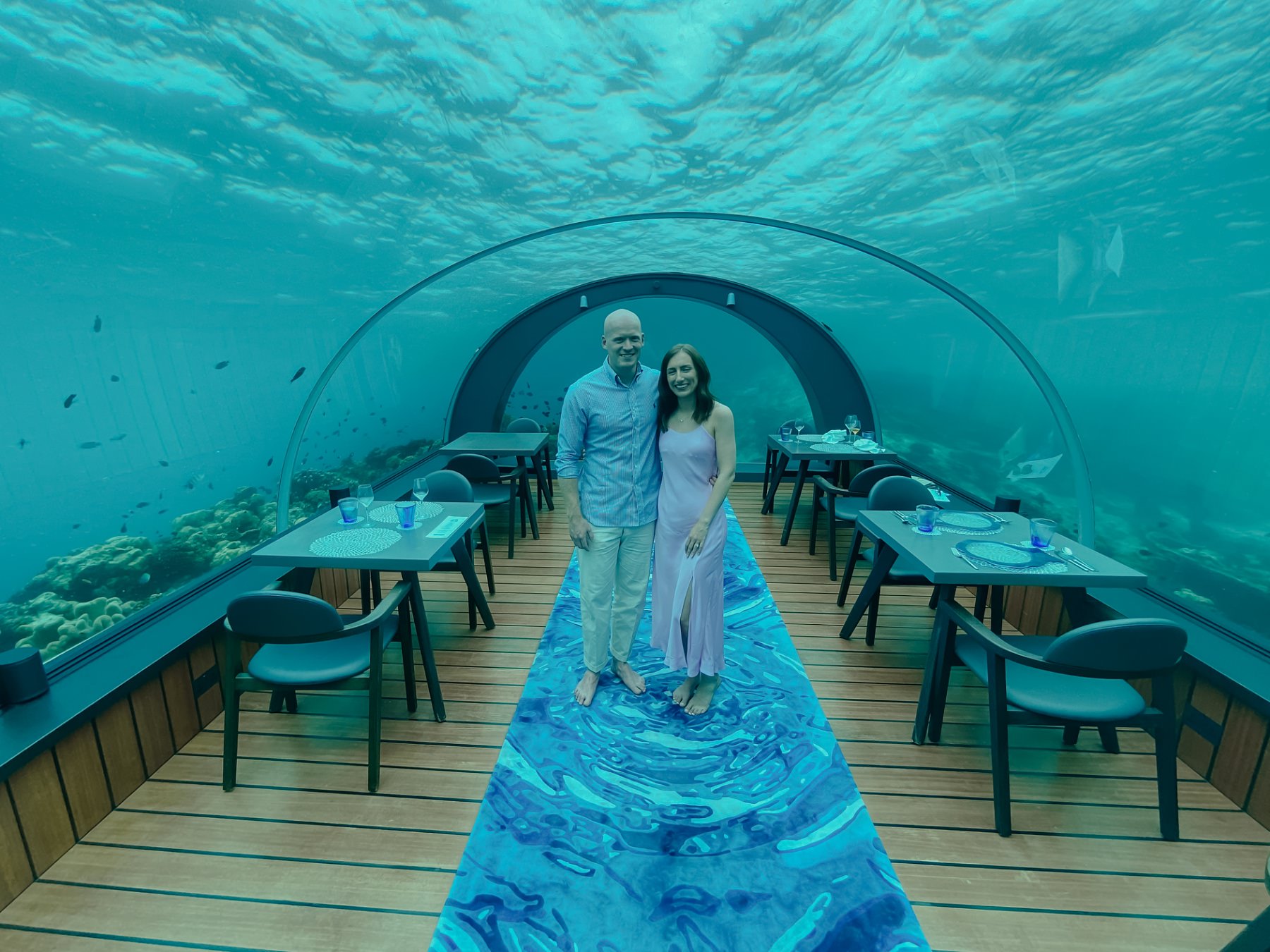 honeymoon advice hurawalhi island resort the maldives 5.8 Undersea Restaurant underwater couple posing for photo