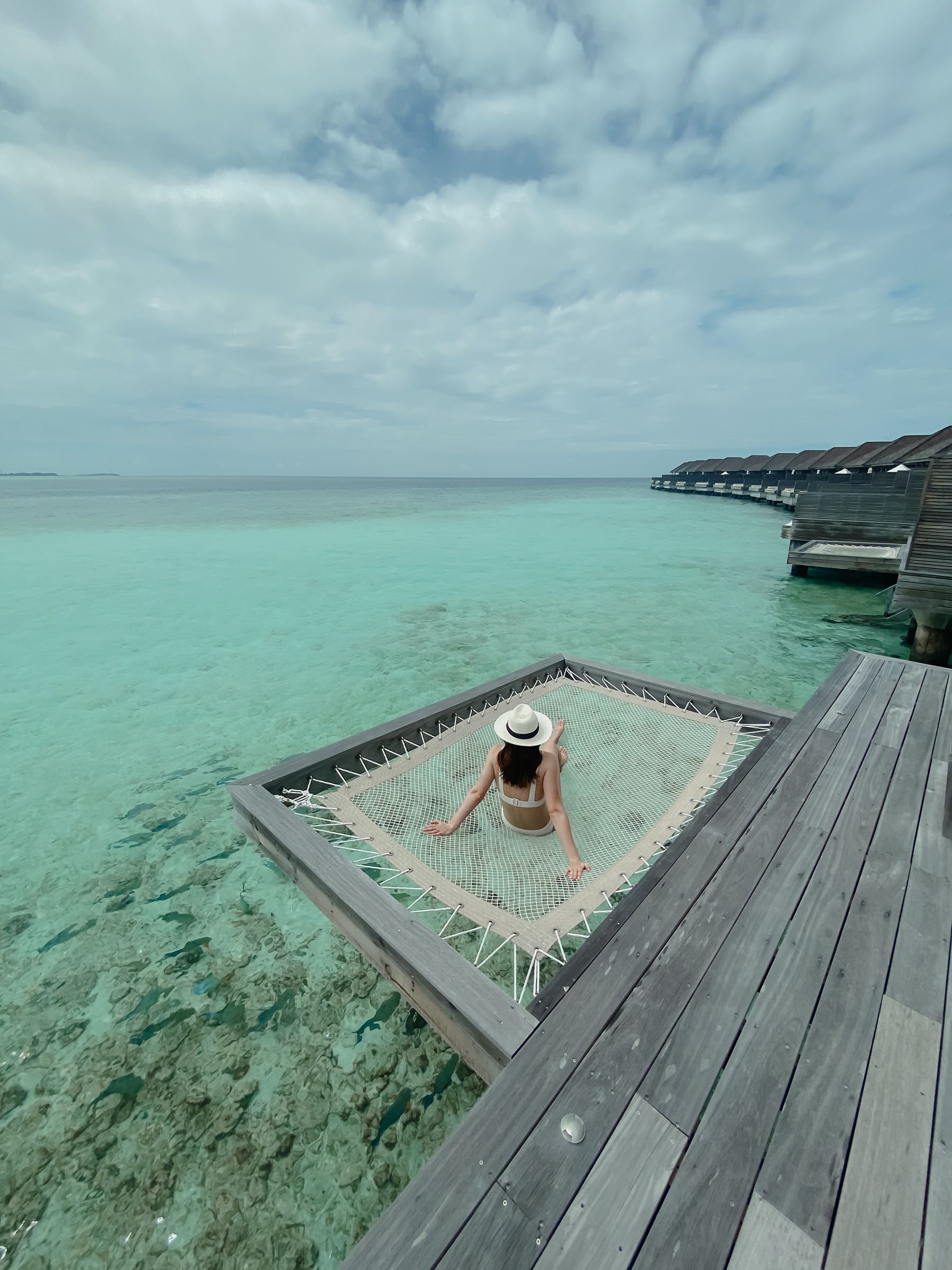 honeymoon reviews the maldives island resort beach scene with hammock over the ocean