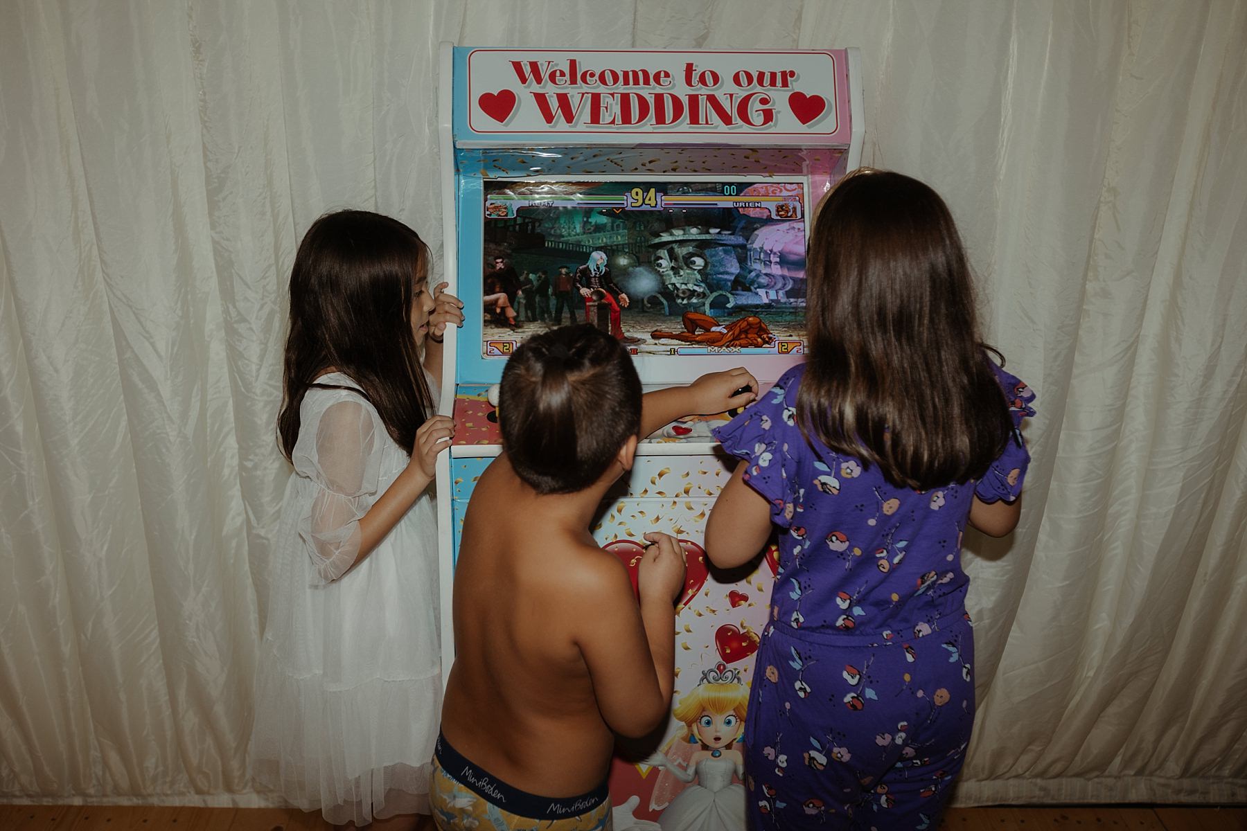 cluny castle wedding scotland reception with video games retro arcade games for guests