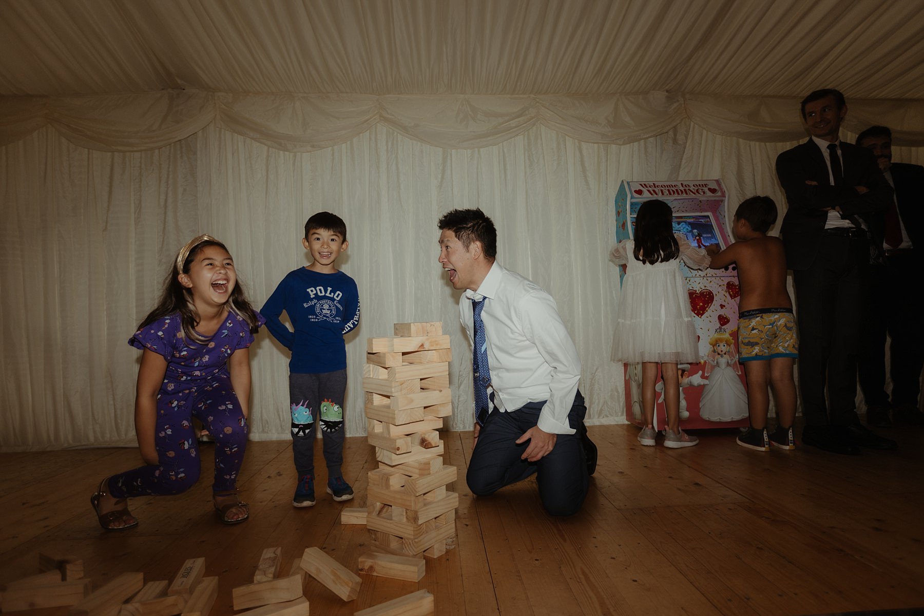 cluny castle wedding scotland reception with retro games for guests jenga evening entertainment