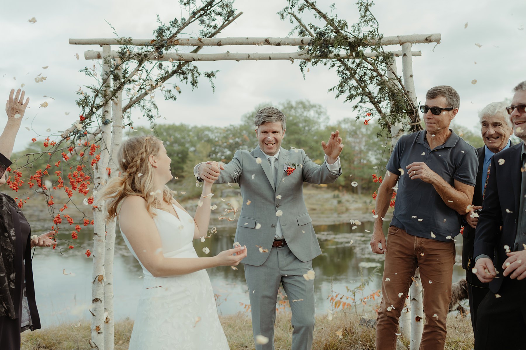 eco-friendly wedding ideas for a sustainable wedding including confetti made from wood shavings from handbuild DIY wedding arch